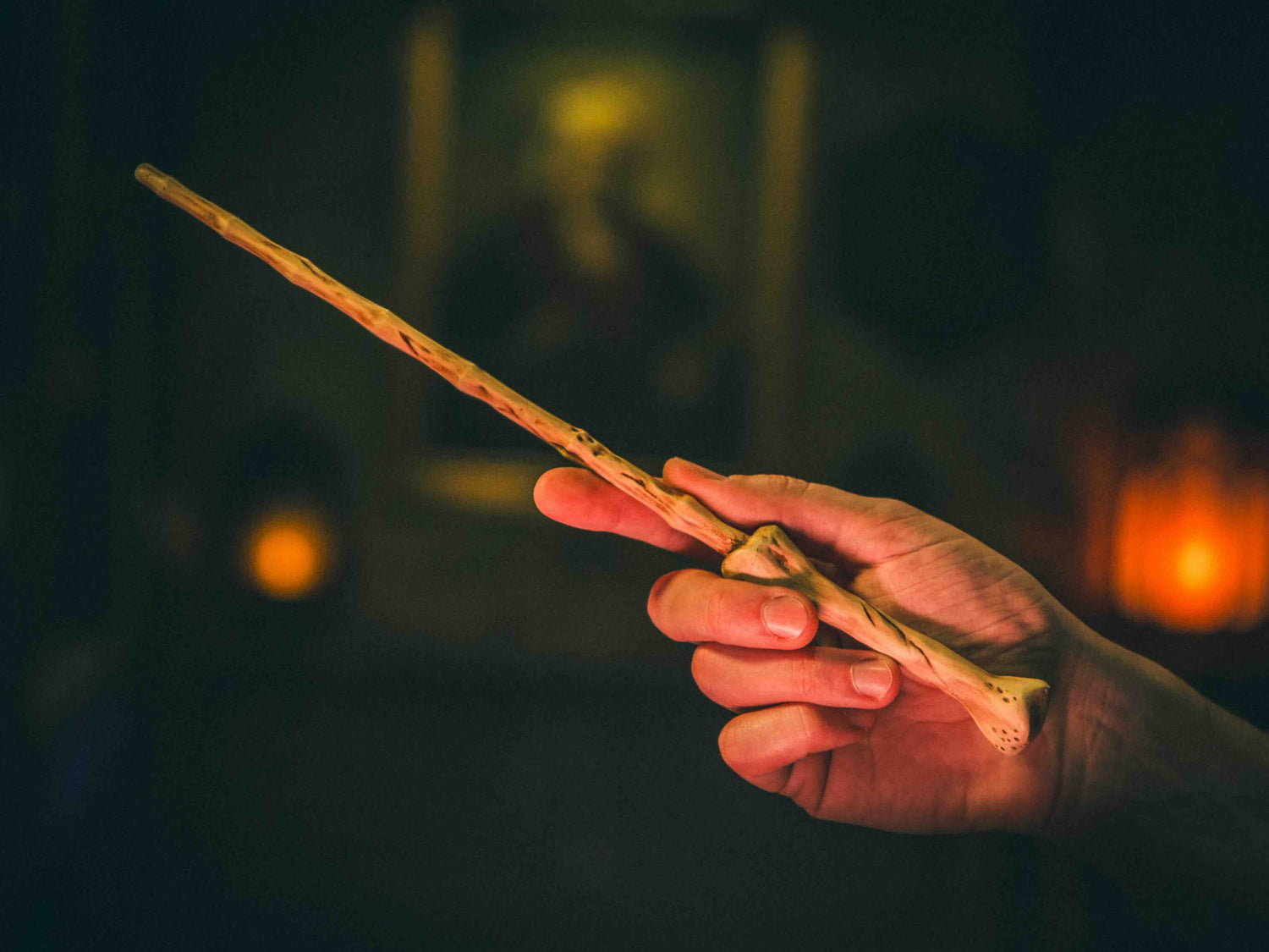 Dragon & Yew Magic Wand being held by a wizard, perfect for dark magic and necromancy.